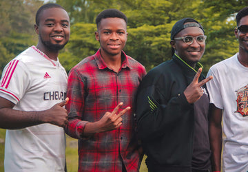 Modern man wearing a versatile navy blue polo and chinos from The Zayaan.