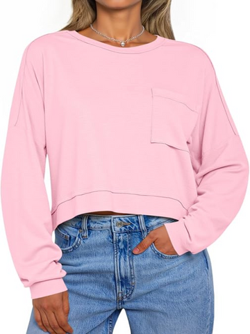 the zayaan-Person wearing a pink sweatshirt and blue jeans on a white background